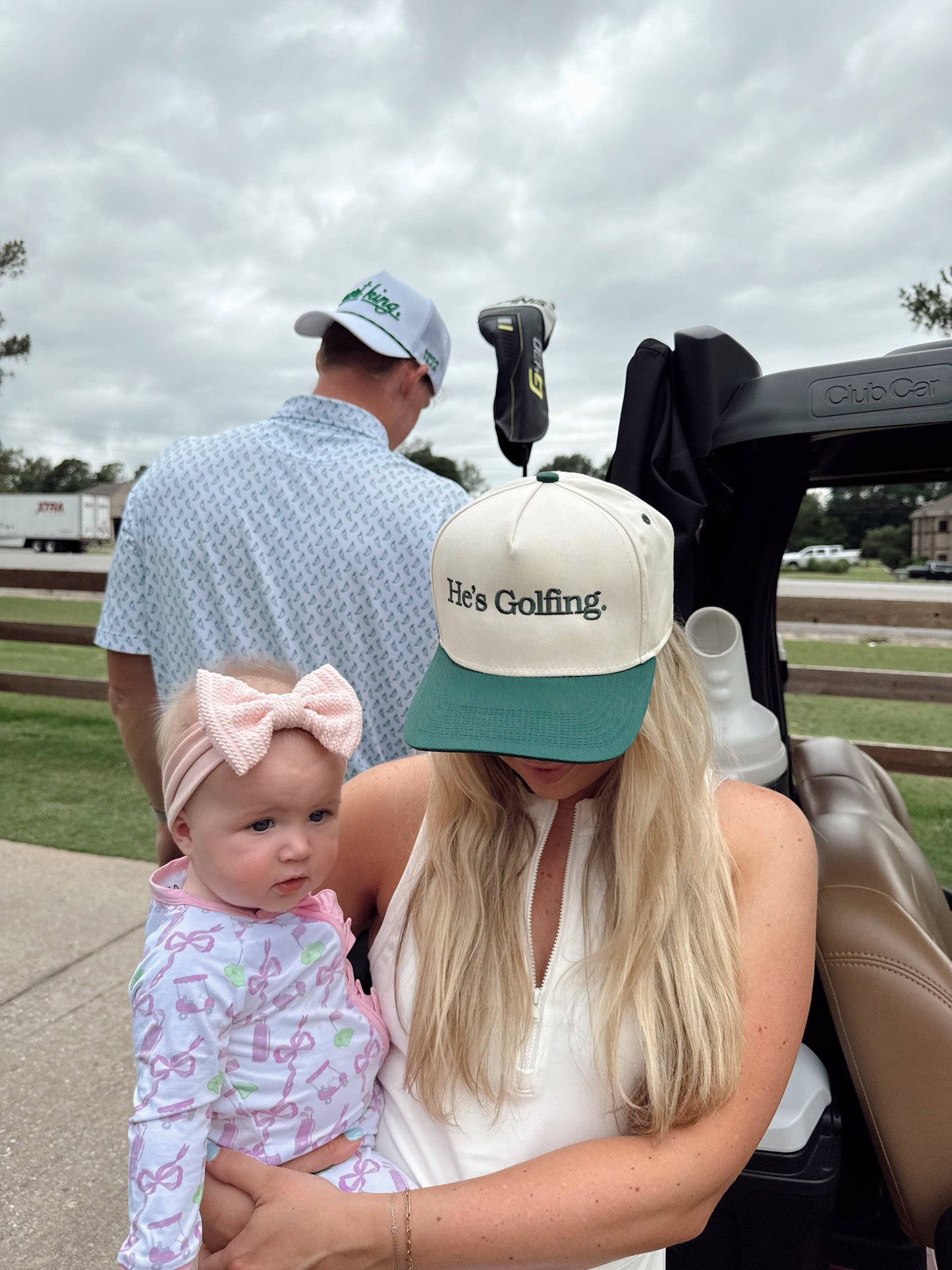 He's Golfing - Green Vintage Trucker Hat